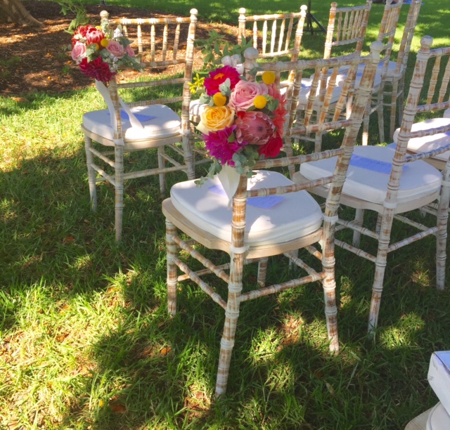 Limewash Chairs with ceremony flowers